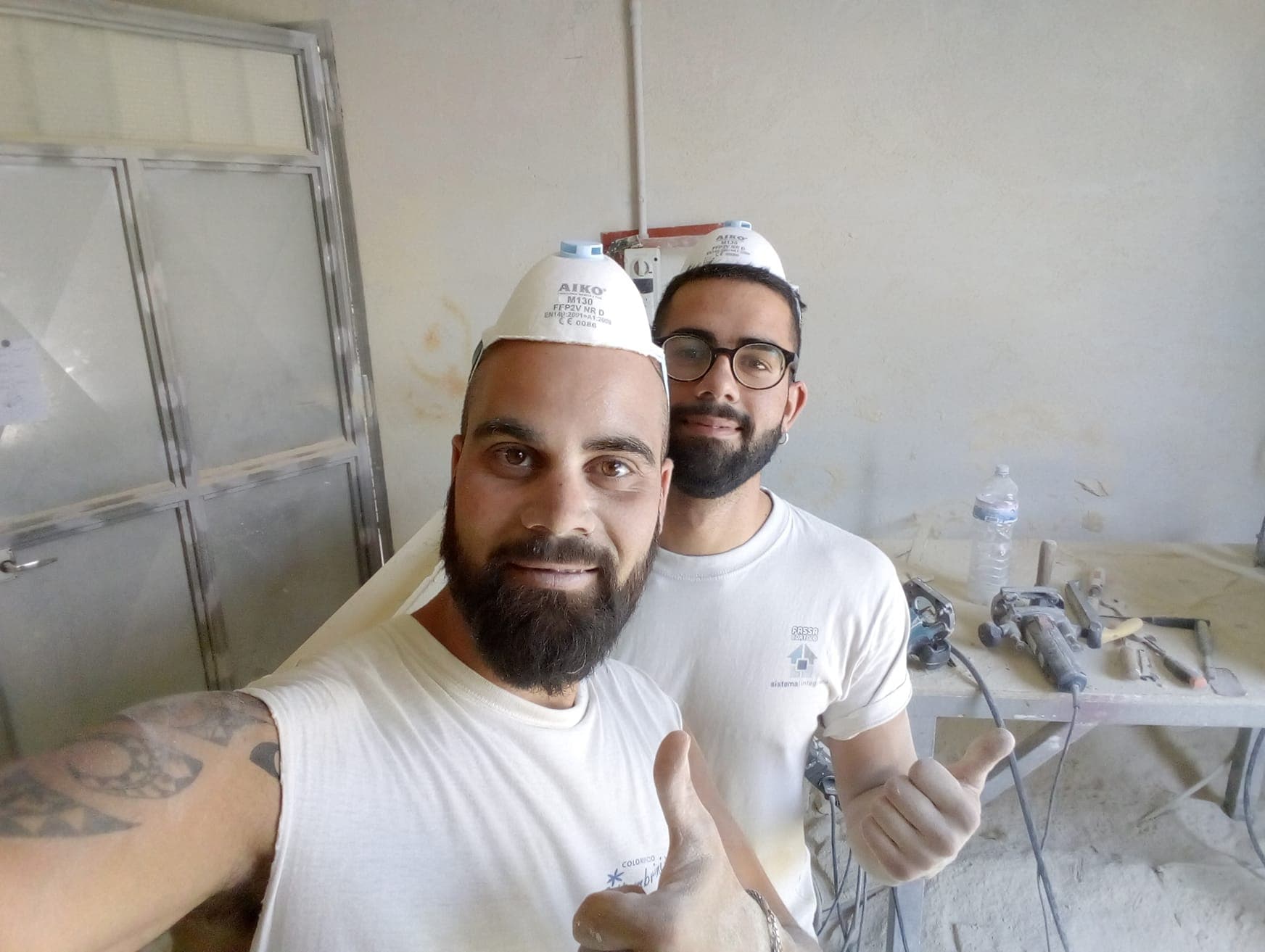 Portrait of the two artisans, Matteo and Dario, in their workshop.